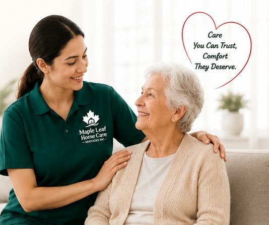 Caregiver sharing a warm moment with a senior client at home